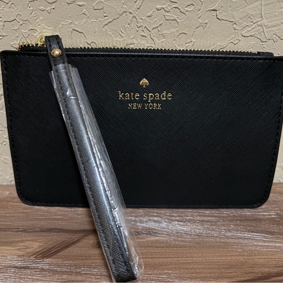 kate spade Handbags - kate spade Black Saffiano Zip Wristlet with Gold Logo